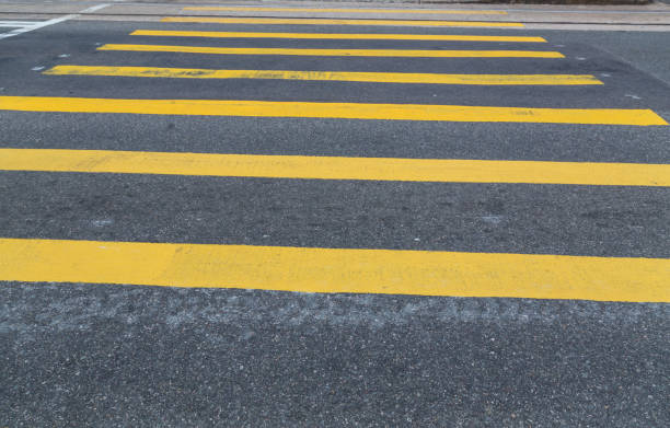 istock Yellow crosswalk on asphalt 649850808