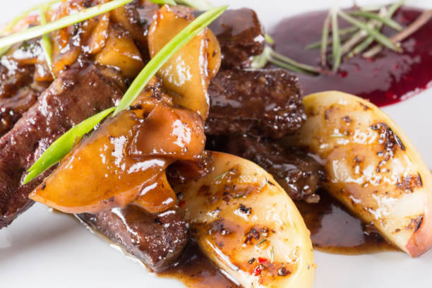 istock sliced meat with grilled potatoes with caramelized sauce 649855340