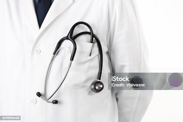 Doctor With Stethoscope In Pocket Stock Photo - Download Image Now - Doctor, Coat - Garment, Close-up