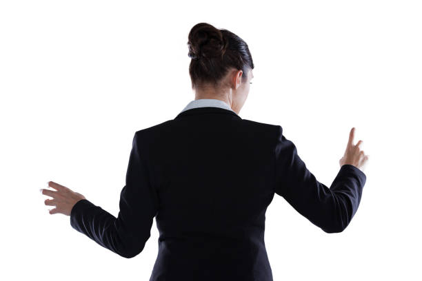 istock Rear view of businesswoman using digital screen 649860536