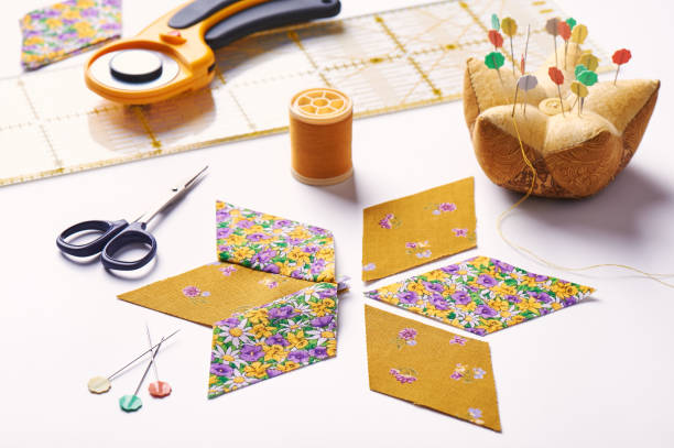 istock Design  element of  quilt in progress, prepared cut pieces and sew one around accessories, patchwork 649864280