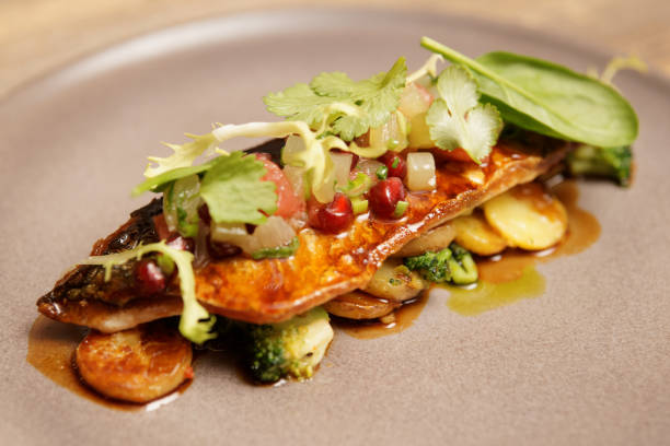 istock Fish fillet with vegetables and potatoes 649870728