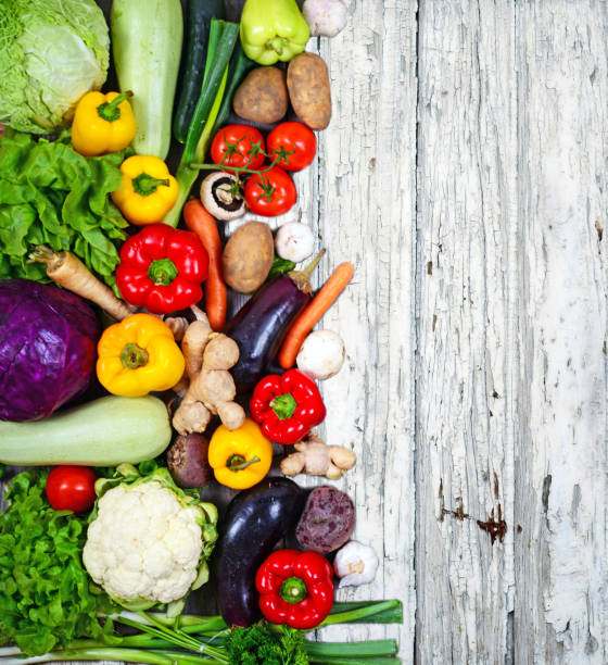 istock Huge group of fresh vegetables on wooden  table - High quality studio shot 649871082
