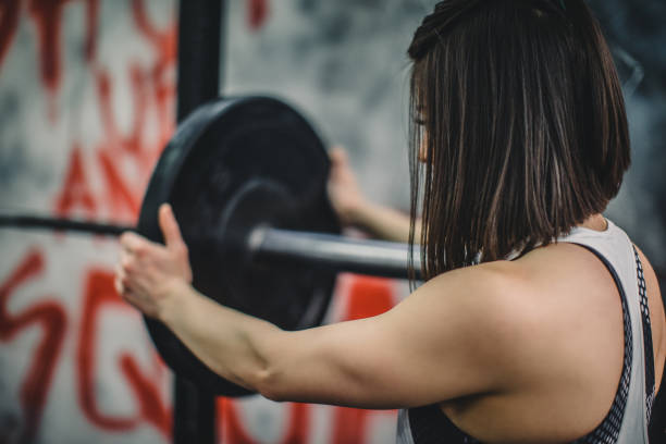 istock Strong woman in gym 649877958