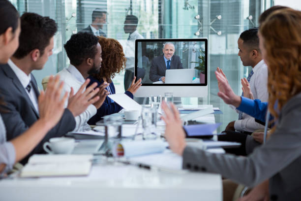 istock Business people looking at a screen during a video conference 649881380