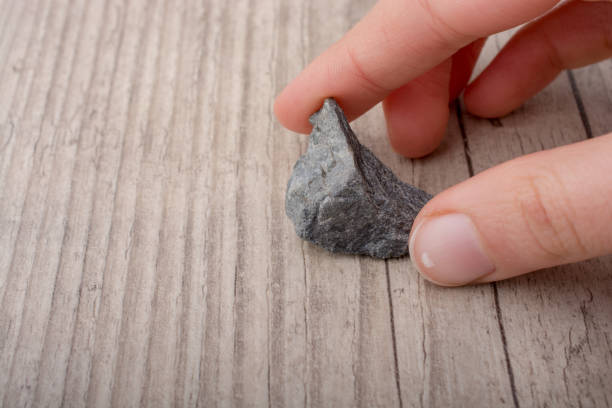 istock Hand holding little stone in hand 649881948