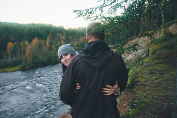 istock Couple in Love Outdoors on River Coast 649885496