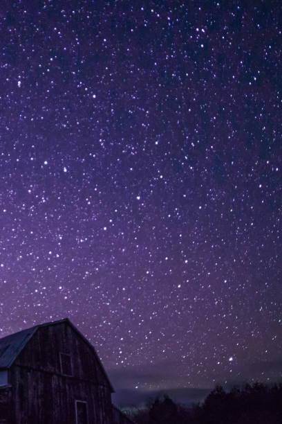 istock Rural Barn at night with stars and constellations 649885910