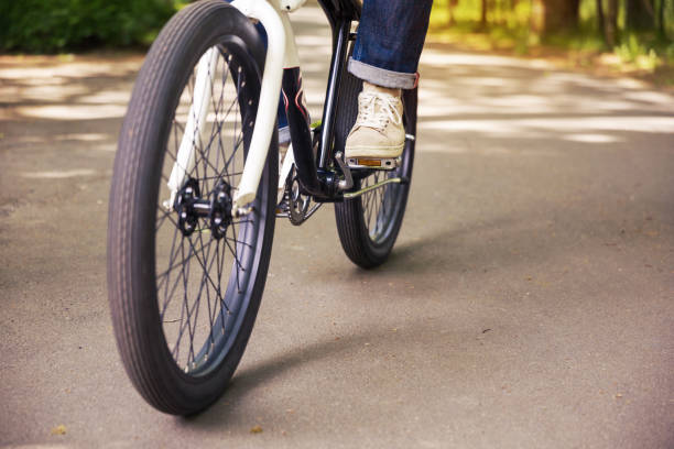 istock Man leg on bicycle pedal 649889828