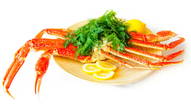 istock crab legs with lemon on a plate. Steamed crab 649901842