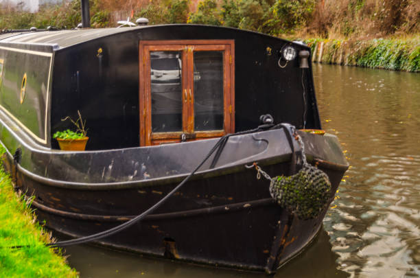 istock old black barge on the canal, old boat 649901874
