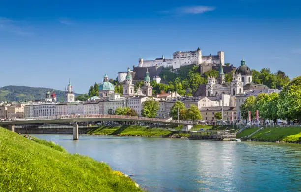 Beautiful view of Salzburg skyline with Festung Hohensalzburg and Salzach river in summer, Salzburg, Salzburger Land, Austria