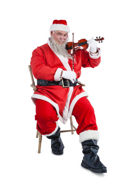 istock Smiling santa claus playing violin 649926104