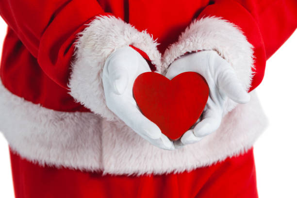 istock Santa claus showing red heart shape 649929484