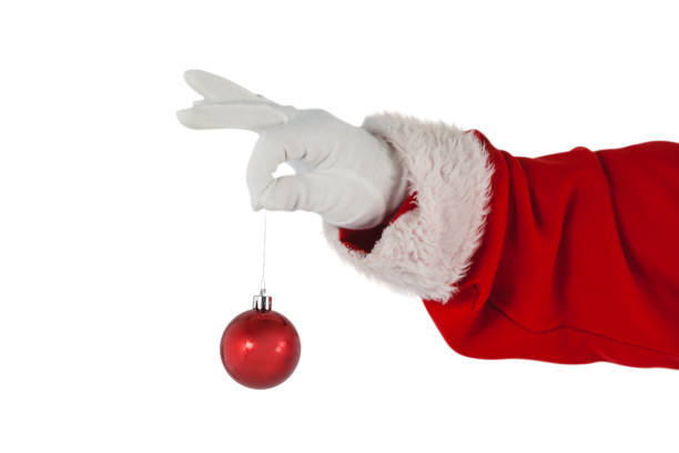 istock Santa claus holding christmas bauble 649932226