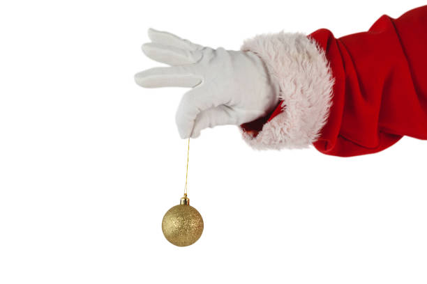 istock Santa claus holding christmas bauble 649932330