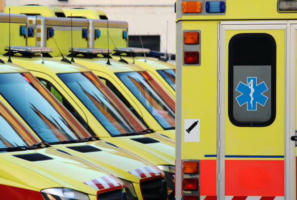 detail of emergency ambulance cars in hospital yard stock photo