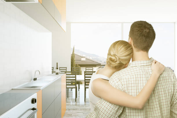 istock Caucasian couple in bright kitchen 649952748
