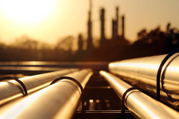 istock golden sunset in crude oil refinery with pipeline system 649955168