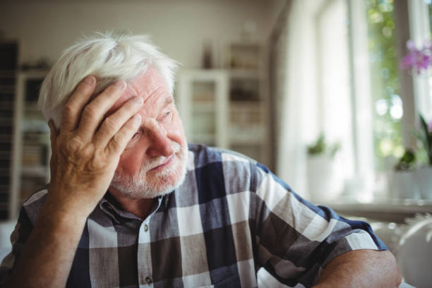 istock Tensed senior man looking away 649964118