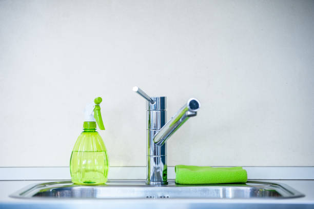 istock Colorful Cleaning Supplies In The Kitchen 649975632