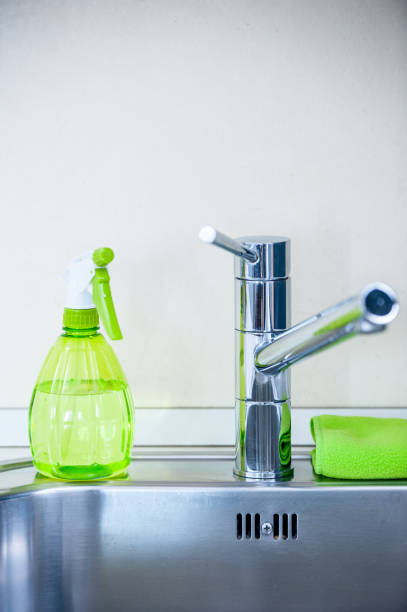 istock Colorful Cleaning Supplies In The Kitchen 649975860