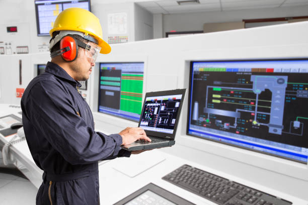 istock Electrical engineer working at control room of thermal power plant 650025454