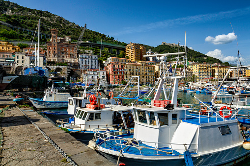 A group of fishing boats lined up at Wajima Port in Noto