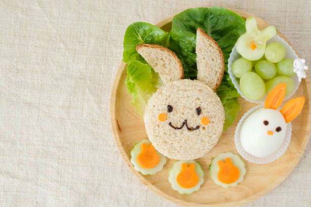 istock Bunny rabbit Easter lunch plate, fun food art for kids 650048172