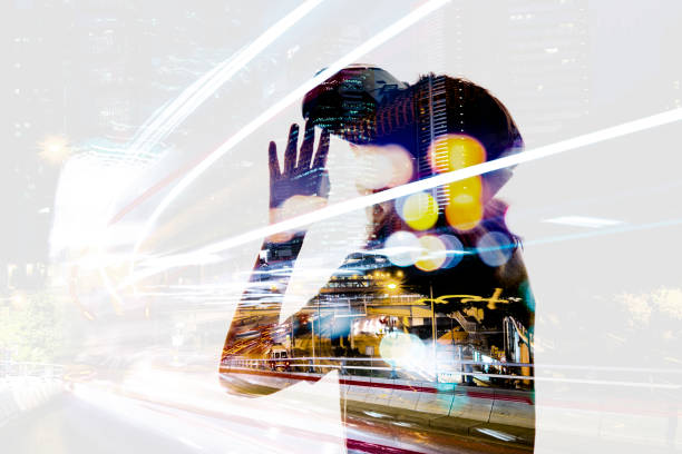 istock Double exposure of people using the virtual reality headset 650060096