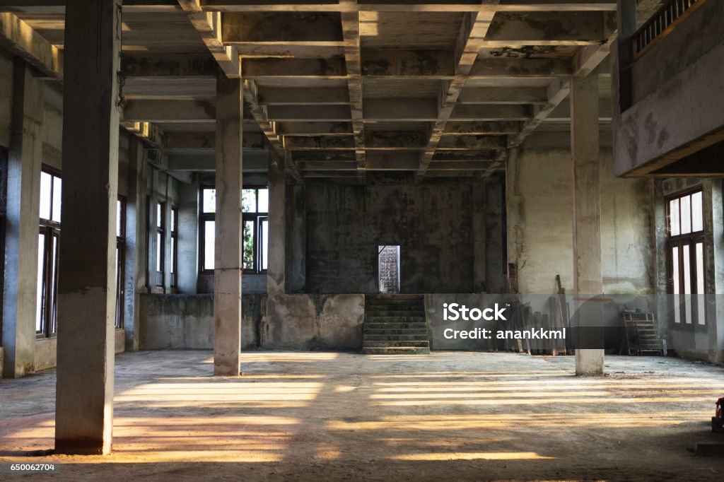 interior of an old abandoned building interior of an old abandoned building view Construction Site Stock Photo