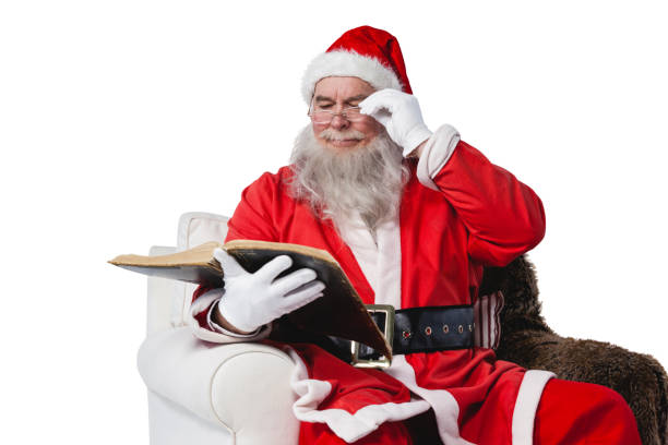 istock Santa claus reading bible 650062714