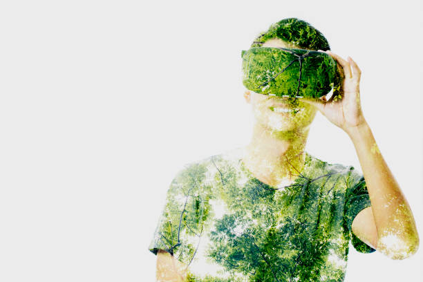 istock Double exposure of people using the virtual reality headset 650070960