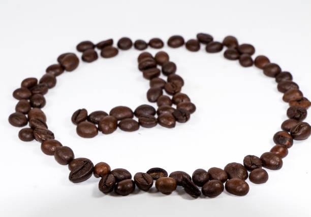 istock coffee beans in the form of hours on a white background 650073890