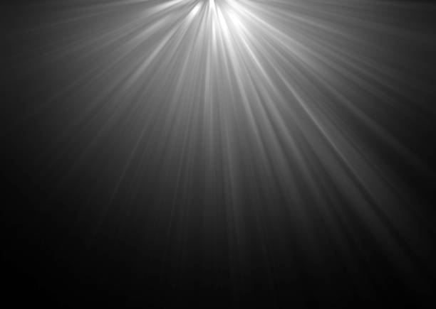 istock abstract beautiful rays of light on black background. 650091250