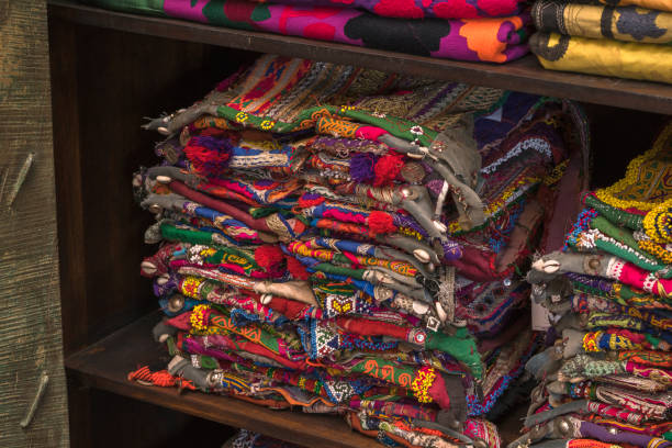 A pile of colorful rugged Peruvian textile and fabrics.