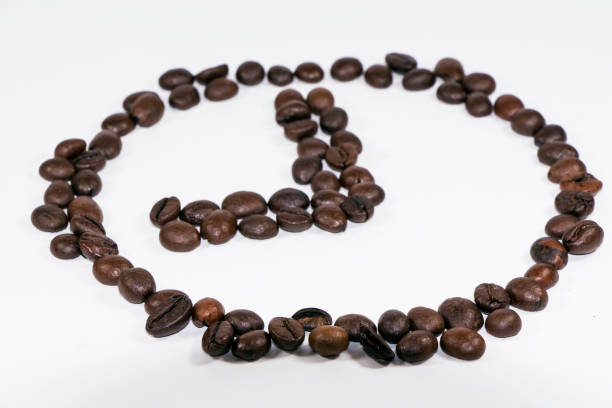 istock coffee beans in the form of hours on a white background 650120914