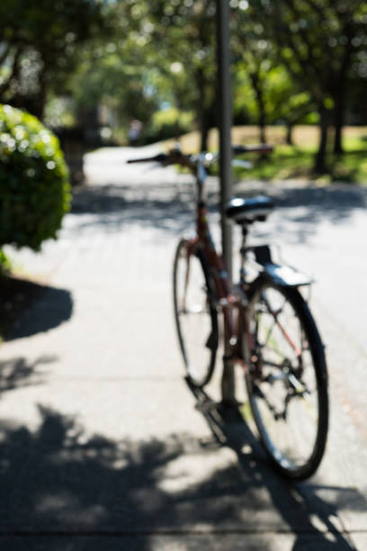 istock Blur view of bicycle parked in a park 650129254