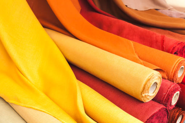 istock Colorful rolls of natural linen cloth 650141718