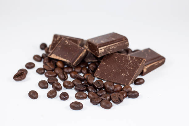 istock pieces of chocolate with coffee beans on a white background 650158070