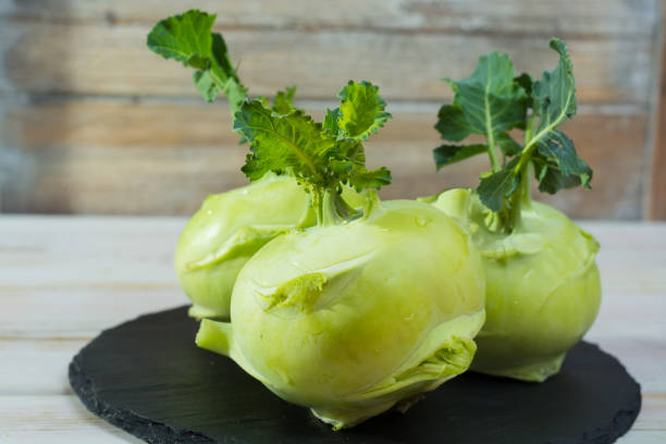 Fresh kohlrabi with green leaves reay to eat
