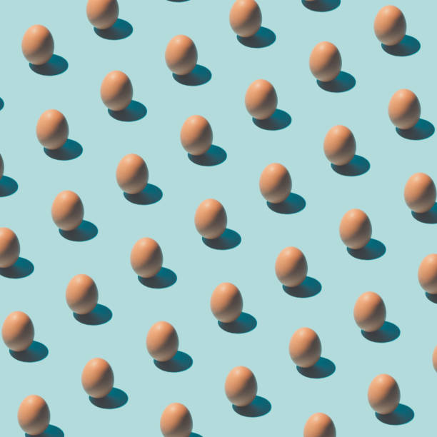 istock Pattern made of eggs on pastel blue background. Minimal food concept. 650176134
