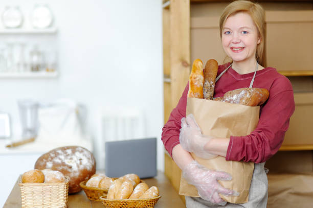 istock Portrait of clerk at nice bread store. 650177058