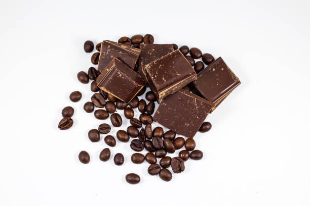 istock pieces of chocolate with coffee beans on a white background 650183856
