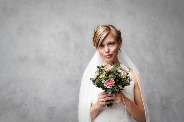 istock Beautiful bride with flowers 650191446