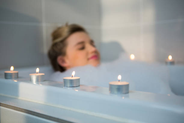 istock Woman taking bath in bathtub 650197164