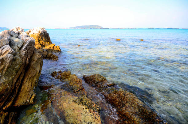Rocks at sea and ship