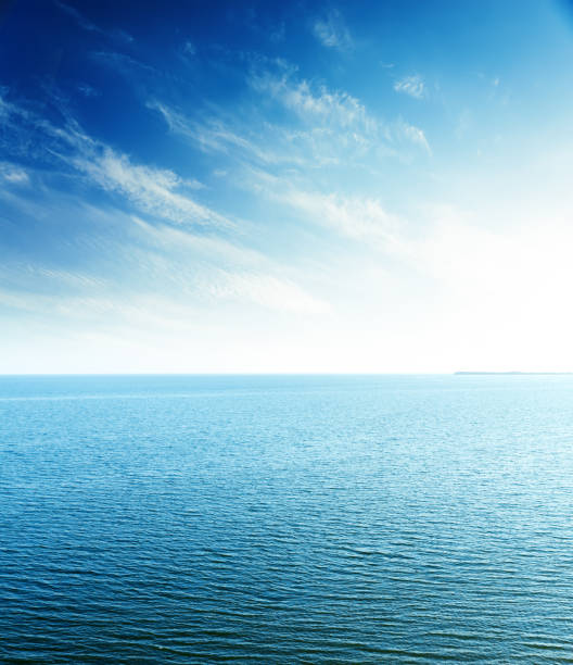 perfect sunset in blue sky over sea. aerial view