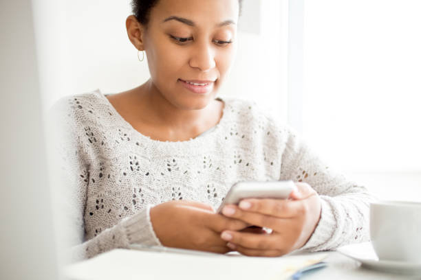 istock Smiling businesswoman using wi-fi on smartphone 650234740