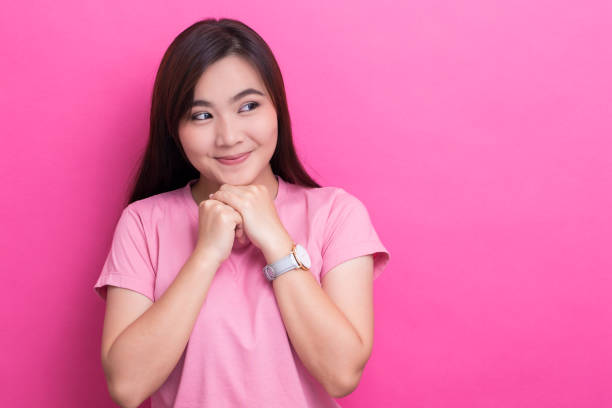 istock Shy woman smiling 650235226
